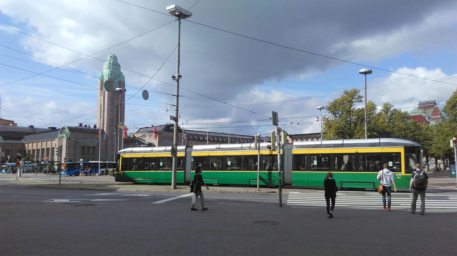 Helsinki street view - Main railway station and tram