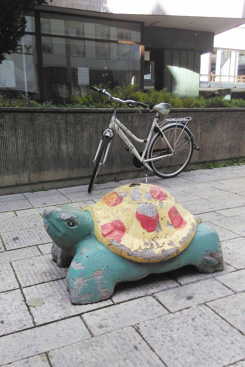 Stone tortoise at a Finnish street